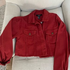 Cropped orange/red denim material jacket. Great for fall!!